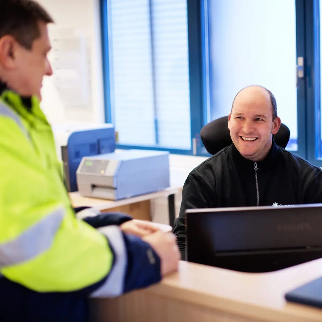 Medewerkers van Constellation Cold aan het werk op kantoor